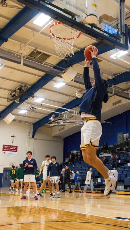 Explosive vertial leap shown on the hardwood