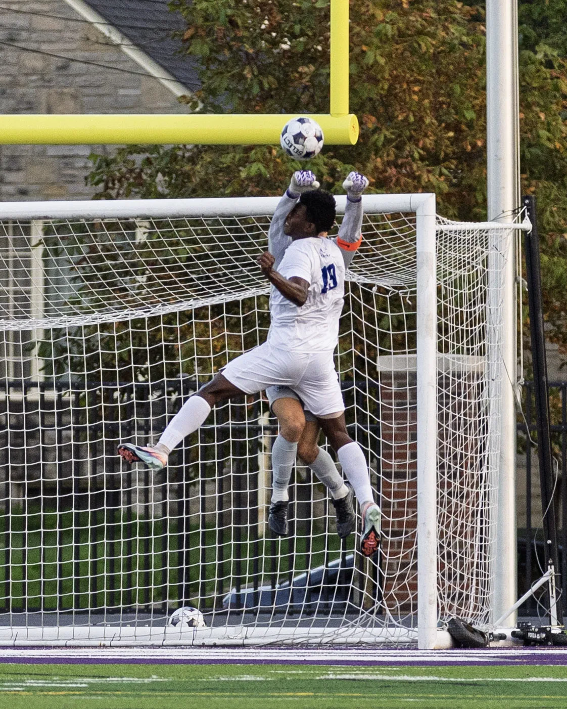 Contested high ball at the crossbar